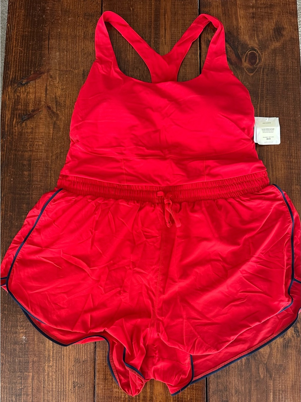 Fabletics Red Racerback Athletic Romper with Navy Trim